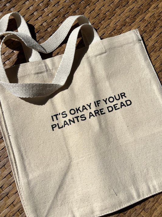 “It’s okay if your plants are dead” tote bag